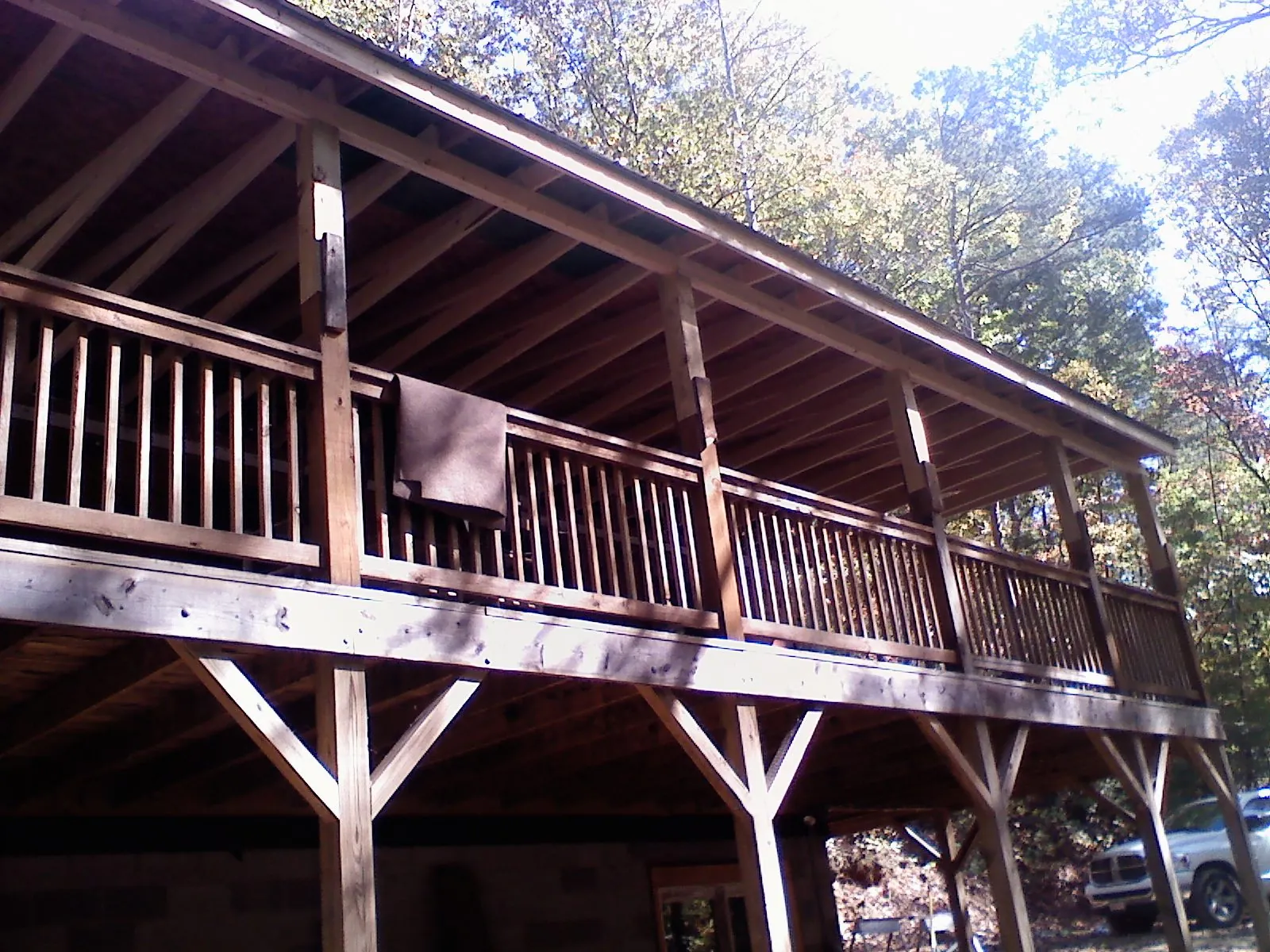 Timber framing under a new elevated porch and deck — Roof Leak Repair in Point Harbor by Roofing Brothers